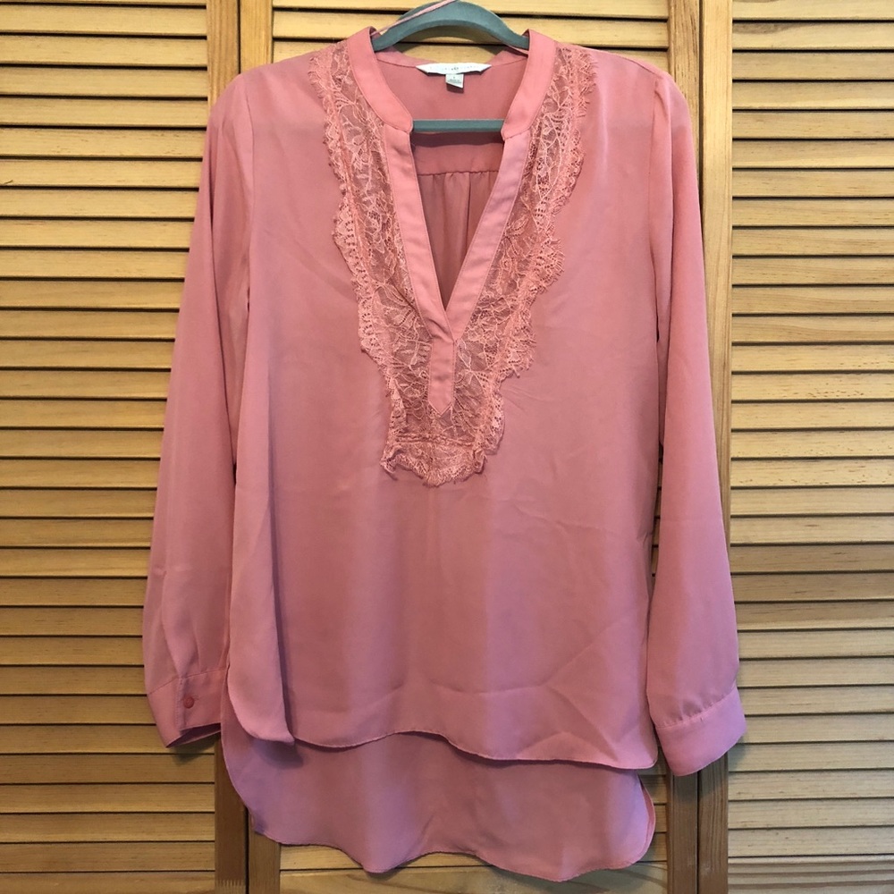 Pink blouse with lace neck detail